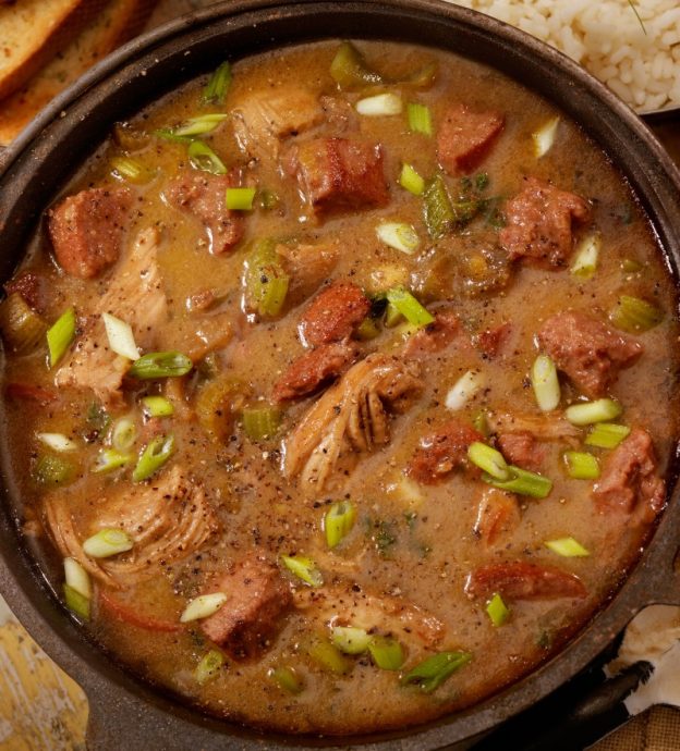 A large pot of chicken and sausage gumbo.