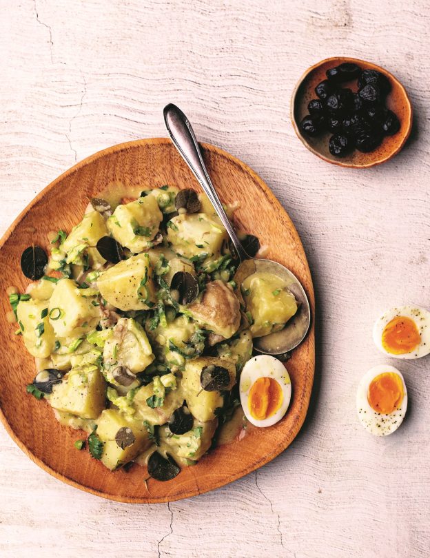 A warm potato salad with hardboiled eggs