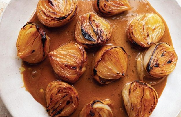A plate of roasted miso onions in sauce