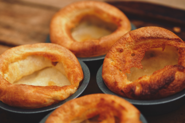 A pan of golden brown Yorkshire puddings